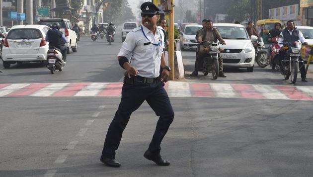 Singh’s colleagues were initially apprehensive when he used moves popularised by the late King of Pop to attract attention and manage traffic but they have since warmed to his unorthodox tactics, and he now gives moonwalking lessons to his fellow officers. (Indranil Mukherjee / AFP)