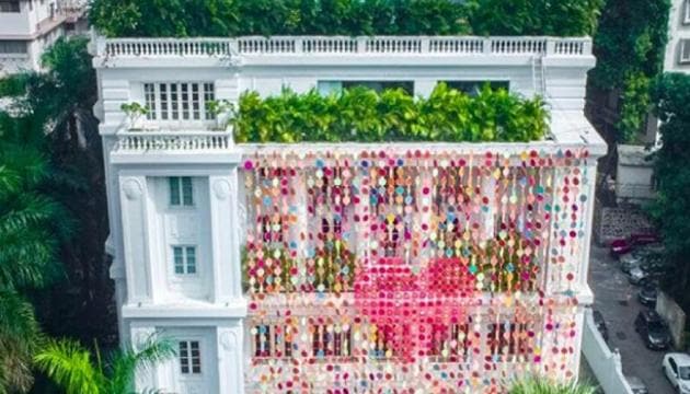 Designer and artist Manish Arora embellished Mumbai’s Jindal mansion with yards of cloth, hand embroidered and printed, as a symbol of love and peace.(Manish Arora Fashion/Instagram)