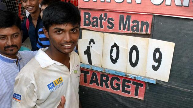 Pranav Dhanawade after he scored 1009 runs in an U-16 inter-school tournament. Life has changed drastically for the Mumbai youngster since then, but he hasn’t given up on making it to the Indian cricket team just yet. (HT Photo) Pranav Dhanawade after he scored 1009 runs in an U-16 inter-school tournament. Life has changed drastically for the Mumbai youngster since then, but he hasn’t given up on making it to the Indian cricket team just yet. (HT Photo)