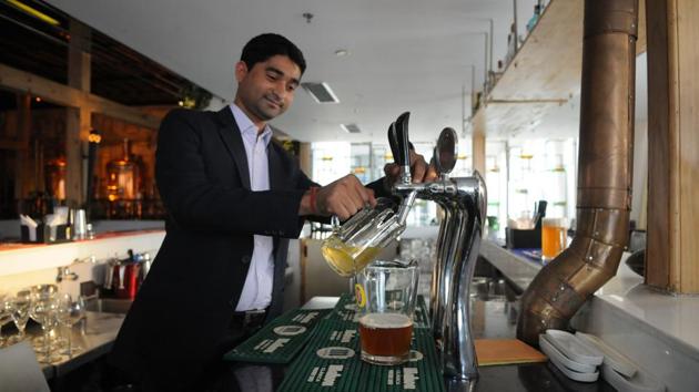 The staff at pubs and bars said people prefer wine and beer when dining out because they believe bottles of hard liquor are tampered with. (HT File Photo) The staff at pubs and bars said people prefer wine and beer when dining out because they believe bottles of hard liquor are tampered with. (HT File Photo)