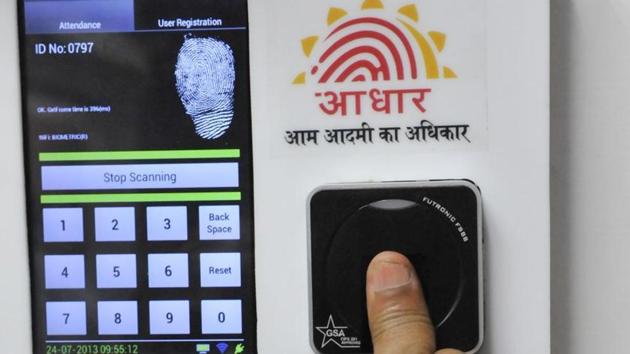 Employees mark their attendance through Aadhaar based System in the Planning Commission.(HT File Photo)