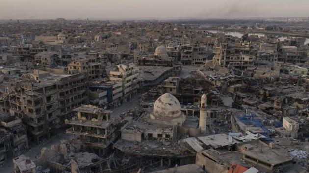 Aerial view of destroyed building and shops in the Old City of Mosul, Iraq on November 15, 2017. The scope of destruction in the neighbourhood is comparable to some of the worst urban battles of World War II, and the cost of rebuilding is nearly incalculable. The Trump administration has told the Iraqis it won’t pay for a massive reconstruction drive. (Felipe Dana / AP) Aerial view of destroyed building and shops in the Old City of Mosul, Iraq on November 15, 2017. The scope of destruction in the neighbourhood is comparable to some of the worst urban battles of World War II, and the cost of rebuilding is nearly incalculable. The Trump administration has told the Iraqis it won’t pay for a massive reconstruction drive. (Felipe Dana / AP)