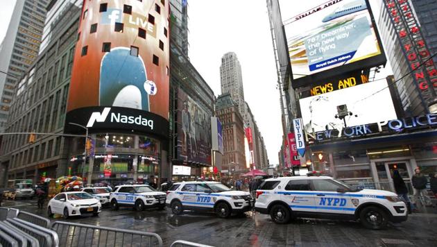 File photo shows New York City police cars parked along a street in New York's Times Square. (AP) File photo shows New York City police cars parked along a street in New York's Times Square. (AP)