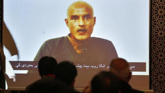 Pakistani journalists watch a video message of imprisoned Indian naval officer Kulbhushan Jadhav during a press conference by foreign ministry spokesman Mohammad Faisal, Islamabad, December 25, 2017 (AP) Pakistani journalists watch a video message of imprisoned Indian naval officer Kulbhushan Jadhav during a press conference by foreign ministry spokesman Mohammad Faisal, Islamabad, December 25, 2017 (AP)