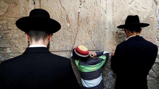 Hasidic Jews attend a special prayer for rain at the Western Wall in Jerusalem's Old City on December 28, 2017. (Ronen Zvulun / REUTERS) Hasidic Jews attend a special prayer for rain at the Western Wall in Jerusalem's Old City on December 28, 2017. (Ronen Zvulun / REUTERS)