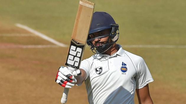 Delhi's batsman Himmat Singh celebrates after completing his half century during the Ranji Trophy final between Delhi and Vidarbha in Indore on Friday. (PTI) Delhi's batsman Himmat Singh celebrates after completing his half century during the Ranji Trophy final between Delhi and Vidarbha in Indore on Friday. (PTI)