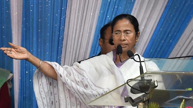 West Bengal Chief Minister Mamata Banerjee speaks during a programme to distribute cheques to the farmers for the loss of their crops in the floods, at Sagar Island on Wednesday. (PTI) West Bengal Chief Minister Mamata Banerjee speaks during a programme to distribute cheques to the farmers for the loss of their crops in the floods, at Sagar Island on Wednesday. (PTI)