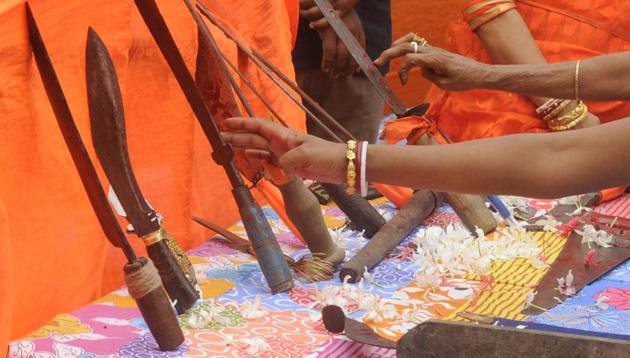 Shastra Puja ceremony at Durgabari, Phuleswar, Howrah District, on September 30, 2017. (HT File Photo)