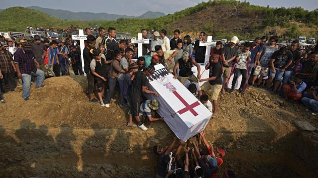 After 632 days, eight of nine tribals, who were killed on August 31, 2015 in Manipur’s Churachandpur village, were buried after an agreement between hill tribes and the state government. The bodies, which were kept in the town’s morgue for almost two years, were finally laid to rest after a mourning ceremony in May this year.  (Ravi Choudhary / HT Photo) 
