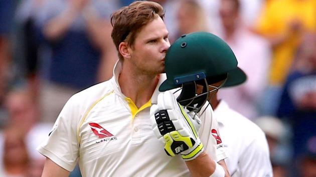 Australia skipper Steve Smith kisses his helmet after reaching his century. (REUTERS)