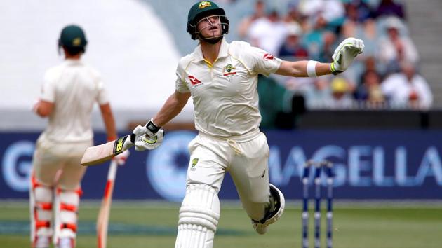 Australia's captain Steve Smith reacts after he was hit by the ball. (REUTERS)