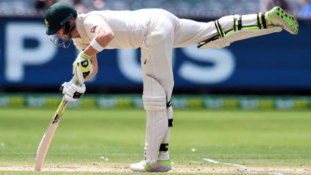 Australia's captain Steve Smith over-balances after a delivery. (AFP)