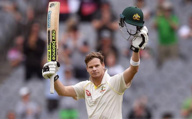 Australia's captain Steve Smith celebrates scoring his century against England on the final day of the fourth Ashes cricket Test match at the Melbourne Cricket Ground on Saturday.(AFP)