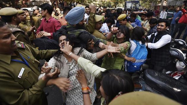 A scene from a violent clash between students from the ABVP, AISA and other bodies in Delhi University in February.  (Raj K Raj / HT Photo) 