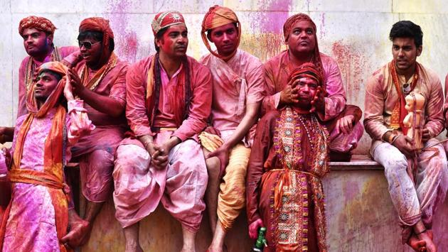In Nandgaon, UP, the tradition of playing Holi, especially Laathmar Holi, attracts thousands of visitors from across the country in what is India’s most colourful festival.  (Ajay Aggarwal / HT Photo) 