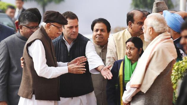 Rahul Gandhi (third from left), the newly elected President of the Indian National Congress, seen with BJP’s LK Advani, Sushma Swaraj (centre)  and PM Modi (front, right) during the anniversary of the 2001 Parliament attack at Parliament House in New Delhi on December 13, 2017. (Sushil Kumar / HT Photo) 
