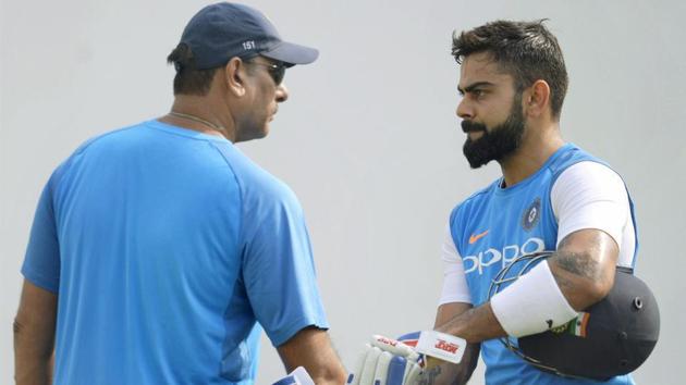 Virat Kohli and Ravi Shastri have the task to guide the Indian cricket team to its first Test series win in South Africa.(PTI)