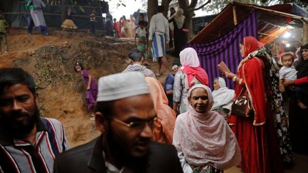 A wedding party arrives for the marriage of Saddam Hussein and Shofika Begum on December 11, 2017. The couple planned to marry even before Rohingya militant attacks on Myanmar security forces on August 25 triggered a brutal counter-attack that the UN has called textbook ethnic cleansing. (Damir Sagolj / REUTERS) A wedding party arrives for the marriage of Saddam Hussein and Shofika Begum on December 11, 2017. The couple planned to marry even before Rohingya militant attacks on Myanmar security forces on August 25 triggered a brutal counter-attack that the UN has called textbook ethnic cleansing. (Damir Sagolj / REUTERS)
