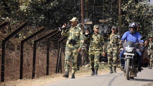 Border Security Force (BSF) personnel take part in a routine patrol near the India-Bangladesh border in Lankamura, on the outskirts of Agartala in Tripura. (AFP file photo)