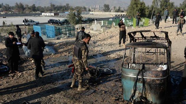 Afghan security personnel inspect the scene of a suicide attack that targeted a funeral ceremony in Jalalabad on December 31, 2017. (AFP Photo) Afghan security personnel inspect the scene of a suicide attack that targeted a funeral ceremony in Jalalabad on December 31, 2017. (AFP Photo)