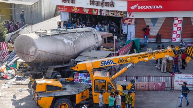 The issue came into the forefront when an IT employee, Swati Orke, 29, died and two others were injured in an accident where a tanker carrying liquid cement rammed into a sweet shop at Navale Bridge on Friday. (Sanket Wankhade/HT PHOTO) The issue came into the forefront when an IT employee, Swati Orke, 29, died and two others were injured in an accident where a tanker carrying liquid cement rammed into a sweet shop at Navale Bridge on Friday. (Sanket Wankhade/HT PHOTO)