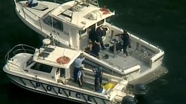 Police vessels are seen after a seaplane crashed into a Sydney river, killing six people on a "wine and dine" sightseeing flight ahead of the city's harbour-centred New Year's Eve celebrations, in this still image taken from a video on December 31, 2017. (Reuters Photo) Police vessels are seen after a seaplane crashed into a Sydney river, killing six people on a "wine and dine" sightseeing flight ahead of the city's harbour-centred New Year's Eve celebrations, in this still image taken from a video on December 31, 2017. (Reuters Photo)