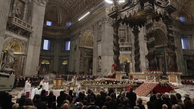 Pope Francis arrives to celebrate a New Year's eve vespers Mass in St. Peter's Basilica at the Vatican. (Andrew Medichini / AP) Pope Francis arrives to celebrate a New Year's eve vespers Mass in St. Peter's Basilica at the Vatican. (Andrew Medichini / AP)