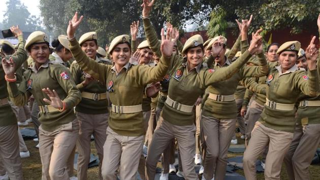 Police personnel dance during New Year celebrations at the Punjab Police recruitment centre in Jalandhar on Monday. (Pardeep Pandit/HT)