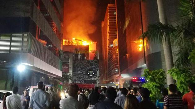 A view from the street after a fire broke out in Mumbai’s Kamala Mills on Friday. (PTI) A view from the street after a fire broke out in Mumbai’s Kamala Mills on Friday. (PTI)