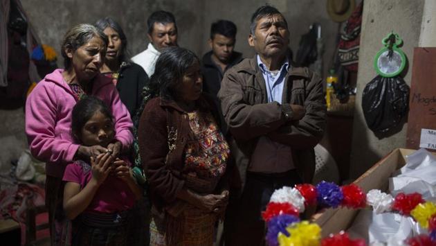Baltazar Perez Sanchez, 71, mourns next to the coffin of his mother Magdalena, who died at age 65 in Guatemala.The villages were created with government funds and support from US evangelical churches, which maintained close relations with then-dictator Efrain Rios Montt. With the signing of peace accords in 1996, the model villages were gradually dismantled. (Luis Soto / AP)