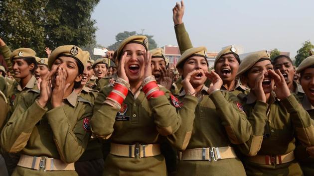 Police personnel participate in a ‘laughing session’ during New Year celebrations at the recruitment centre in Jalandhar on Monday. (Pardeep Pandit/HT)
