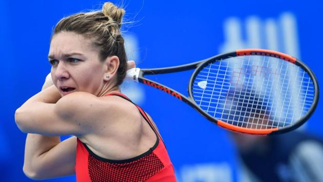 World no. 1 Simona Halep eased into the second round of the Shenzhen Open tennis tournament in Shenzhen on Monday. (AFP) World no. 1 Simona Halep eased into the second round of the Shenzhen Open tennis tournament in Shenzhen on Monday. (AFP)