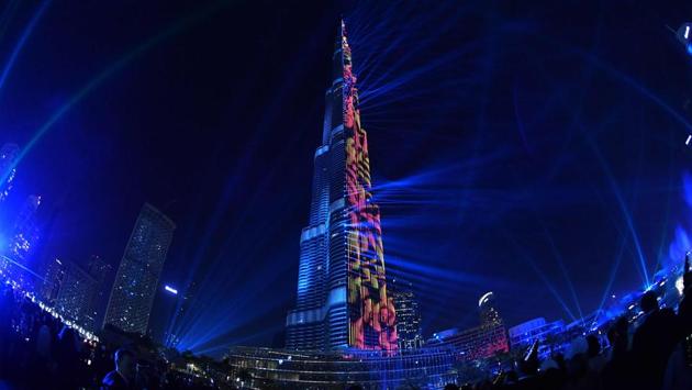 A view of the laser show at Burj Khalifa, the tallest tower in the world, to mark the New Year's eve celebrations in Dubai. (Giuseppe Cacace / AFP) A view of the laser show at Burj Khalifa, the tallest tower in the world, to mark the New Year's eve celebrations in Dubai. (Giuseppe Cacace / AFP)