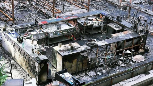 A view of the burnt down restaurant at Kamala Mills, in Mumbai on Saturday. Fourteen people died in the fire.(PTI Photo)