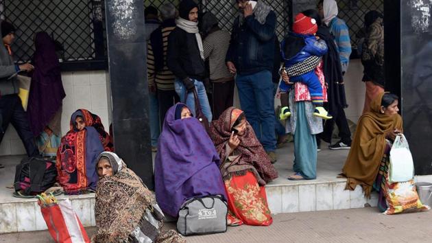Relatives of patients wait outside a hospital while the doctors held a nationwide strike to protest the National Medical Commission Bill, in Patna on Tuesday. (PTI Photo) Relatives of patients wait outside a hospital while the doctors held a nationwide strike to protest the National Medical Commission Bill, in Patna on Tuesday. (PTI Photo)