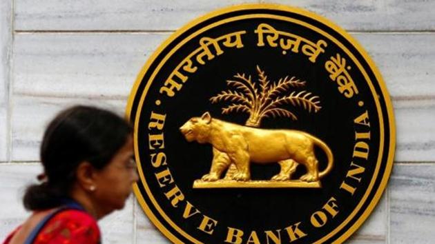 A woman walks past the Reserve Bank of India (RBI) head office in Mumbai. (Reuters File) A woman walks past the Reserve Bank of India (RBI) head office in Mumbai. (Reuters File)
