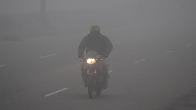 The district administration and police have urged people to drive slowly due to heavy fog. (HT Photo) The district administration and police have urged people to drive slowly due to heavy fog. (HT Photo)