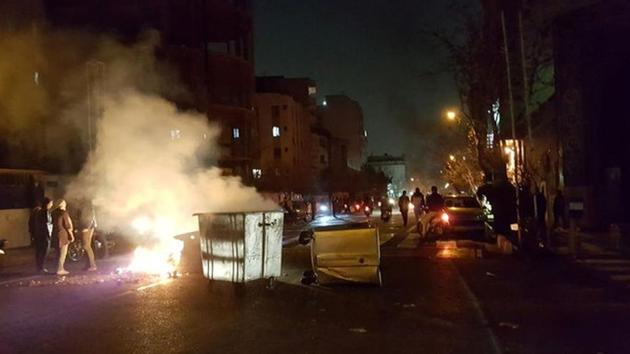 People protest in Tehran on December 30, 2017. The unrest is the worst since crowds took to the streets in 2009 to condemn the re-election of then president Mahmoud Ahmadinejad. (Reuters) People protest in Tehran on December 30, 2017. The unrest is the worst since crowds took to the streets in 2009 to condemn the re-election of then president Mahmoud Ahmadinejad. (Reuters)