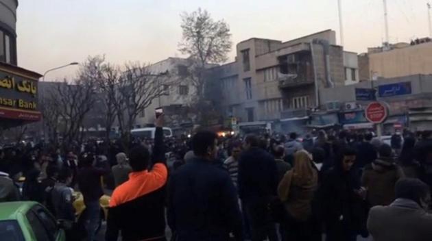 People protest in Tehran on December 30, 2017 in this still image from a video. As protests gathered steam, the government has blamed “hostile elements” based abroad. But analysts suspect Rouhani’s hardline rivals of stoking the initial unrest, pointing to rare statements of support for protesters from hardline clerics such as Mashhad’s Ayatollah Ahmad Alamolhoda, who described anti-austerity, inflation and unemployment demands as “justified”. (REUTERS) People protest in Tehran on December 30, 2017 in this still image from a video. As protests gathered steam, the government has blamed “hostile elements” based abroad. But analysts suspect Rouhani’s hardline rivals of stoking the initial unrest, pointing to rare statements of support for protesters from hardline clerics such as Mashhad’s Ayatollah Ahmad Alamolhoda, who described anti-austerity, inflation and unemployment demands as “justified”. (REUTERS)
