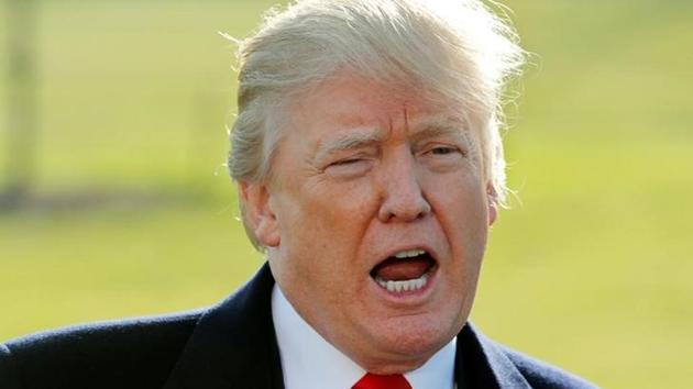 US President Donald Trump talks to reporters before departing the White House for a visit to the Walter Reed Medical Center in Washington, DC on December 21. (Reuters) US President Donald Trump talks to reporters before departing the White House for a visit to the Walter Reed Medical Center in Washington, DC on December 21. (Reuters)