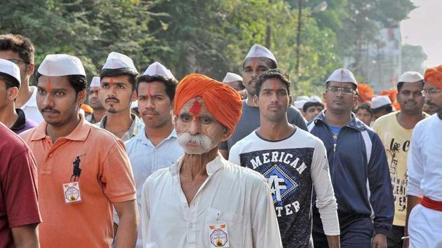 Sambhaji Bhide (foreground, orange turban) is charged with inciting violence at Koregaon Bhima. (HT Photo) Sambhaji Bhide (foreground, orange turban) is charged with inciting violence at Koregaon Bhima. (HT Photo)