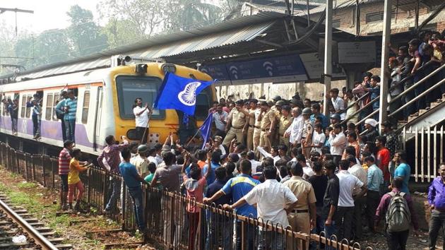 Train services are badly affected after rail rokos on all three corridors of the Central Railway as well as on the Western Railway. The CR main line hit between Kurla and Thane. Protesters also block trains at Dadar. (Praful Gangurde / HT Photo) Train services are badly affected after rail rokos on all three corridors of the Central Railway as well as on the Western Railway. The CR main line hit between Kurla and Thane. Protesters also block trains at Dadar. (Praful Gangurde / HT Photo)