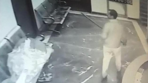 A video screengrab shows the attacker. A woman and three watchmen were among the victims. A video screengrab shows the attacker. A woman and three watchmen were among the victims.