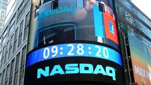 At the closing bell, the tech-rich Nasdaq Composite Index had jumped 1.5% to end the first session of the year at 7,006.90. (AFP File Photo) At the closing bell, the tech-rich Nasdaq Composite Index had jumped 1.5% to end the first session of the year at 7,006.90. (AFP File Photo)