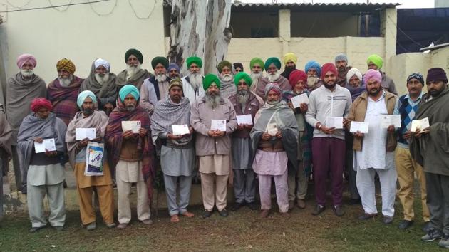 In Faridkot, farmers from several villages of Sadiq block, who own less than 5 acres of land, said they were shocked not to see their names in the lists posted by the administration in their villages for social audit. (HT Photo) In Faridkot, farmers from several villages of Sadiq block, who own less than 5 acres of land, said they were shocked not to see their names in the lists posted by the administration in their villages for social audit. (HT Photo)