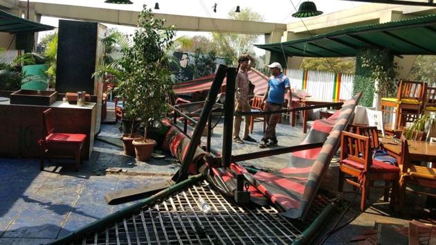 The scene after the fire audit and encroachment drive at a hotel on Siddharth road in Sangamwadi. (HT Photo) The scene after the fire audit and encroachment drive at a hotel on Siddharth road in Sangamwadi. (HT Photo)