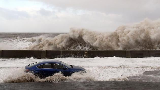 Waves crash over the tidal wall as a motorist travels along the coastal road in New Brighton, north west England. Eleanor is the fourth major storm to hit Europe since December. (Paul Ellis / AFP) Waves crash over the tidal wall as a motorist travels along the coastal road in New Brighton, north west England. Eleanor is the fourth major storm to hit Europe since December. (Paul Ellis / AFP)