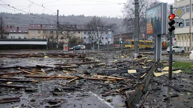 Debris of a roof lies in a street in Stuttgart, Germany where the storm has been baptised Burglind, after the region was hit by a depression. (AFP) Debris of a roof lies in a street in Stuttgart, Germany where the storm has been baptised Burglind, after the region was hit by a depression. (AFP)