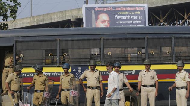 Policemen stand guard during a strike called by Dalit groups in Mumbai on January 3, 2018. A statewide strike was called by several Dalit groups on Wednesday following the death of a 28-year-old Dalit in Pune district. (AP) Policemen stand guard during a strike called by Dalit groups in Mumbai on January 3, 2018. A statewide strike was called by several Dalit groups on Wednesday following the death of a 28-year-old Dalit in Pune district. (AP)