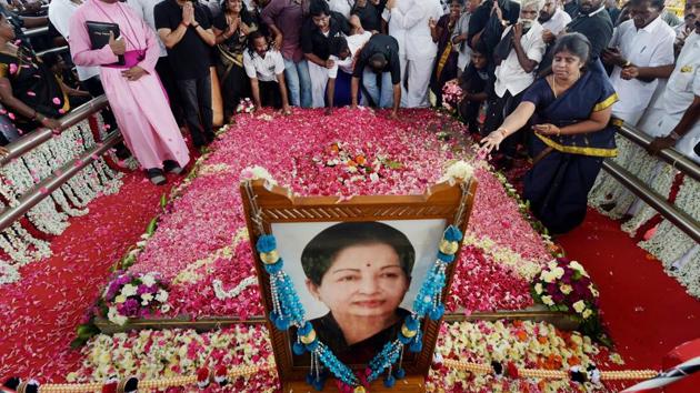 People paying their respects to the late AIADMK supremo and former chief minister J Jayalalithaa on her first death anniversary at her memorial near shores of Marina in Chennai. (PTI File Photo) People paying their respects to the late AIADMK supremo and former chief minister J Jayalalithaa on her first death anniversary at her memorial near shores of Marina in Chennai. (PTI File Photo)